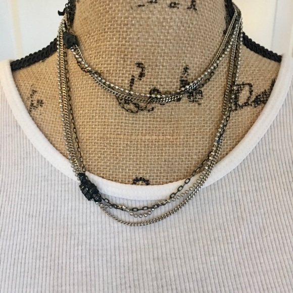 Long multi chain necklace with leather accent. - Picture 2 of 5